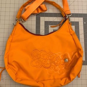 Haiku gently used bag, orange color